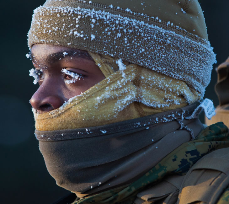 How we work best | decorative photo of a man's face in winter facial covering for the snow